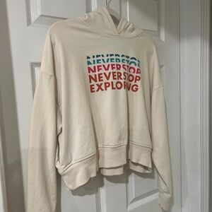 The North Face Cream Hoodie with Multicolor Graphic
